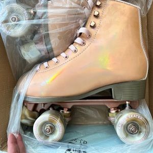 Rose gold Angel skates size 9